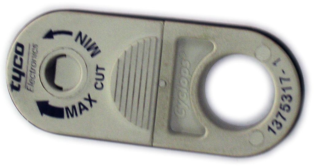 Eina de tall per eliminar la coberta d'un cable. .